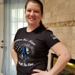 Our lovely customer enjoying her Because They're Mine TBL t-shirt. 