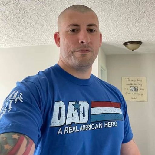 One of our customers enjoying his Father's Day while wearing our Dad- A Real American Hero t-shirt. 