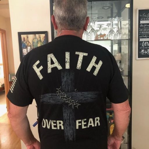 Customer enjoying his new Faith Over Fear T-shirt.