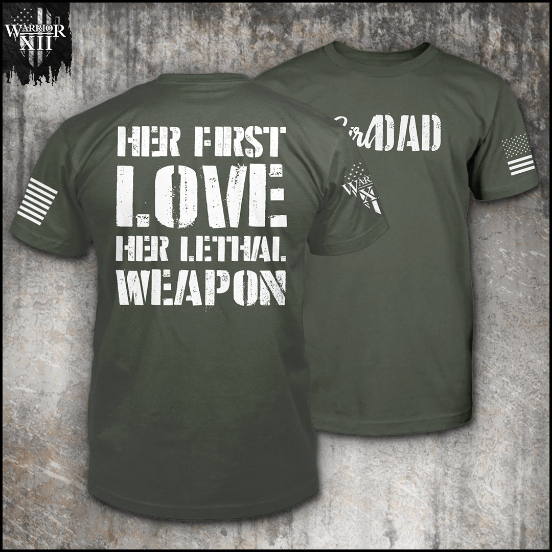 "Her Love, Her Weapon" is printed on a Green t-shirt with the main design printed on the back and a small print on the front left chest.  This shirt features our brand logo on the right sleeve and the American Flag on the left sleeve.