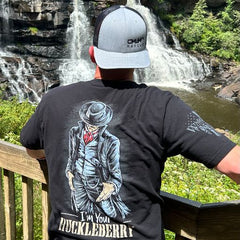 A proud warrior wearing our I'm Your Huckleberry T-Shirt while enjoying the view.