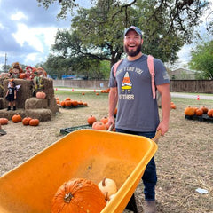 At the pumpkin patch while sporting his new I Don't Like You Either T-shirt.