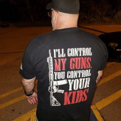 A proud warrior wearing our I'll Control My Guns T-Shirt.