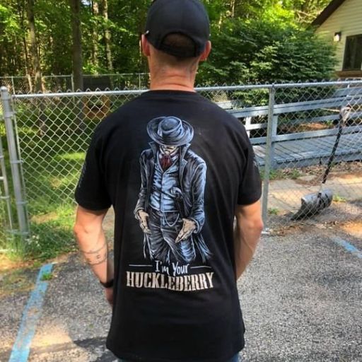 A proud warrior wearing our I'm Your Huckleberry T-Shirt.