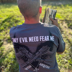 A certified warrior sporting our Only Evil Need Fear Me T-Shirt.
