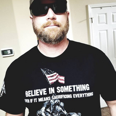 A proud warrior sporting our Sacrificing Everything T-Shirt.