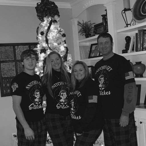 Beautiful family ready for Christmas in their Snitches Get Stitches t-shirts. Tis the season!
