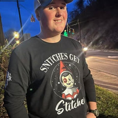Verified Warrior representing his new long sleeve Snitches Get Stiches t-shirt.