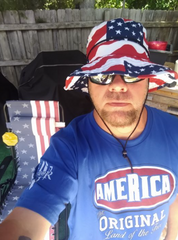 Happy customer celebrating while wearing his America-The Original t-shirt.