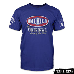 A blue tall sized t-shirt with "America - The Original Land Of The Free" printed on the front of the shirt. The back of this shirt has no printing. This shirt features our brand logo on the right sleeve and the American Flag on the left sleeve.