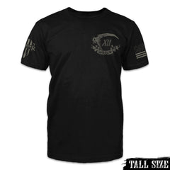 A black tall size shirt with the words Warrior and a reaper scythe printed on the front.