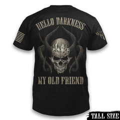A black tall size shirt with the words "Hello darkness my old friend" with a skull and horns printed on the back of the  shirt.