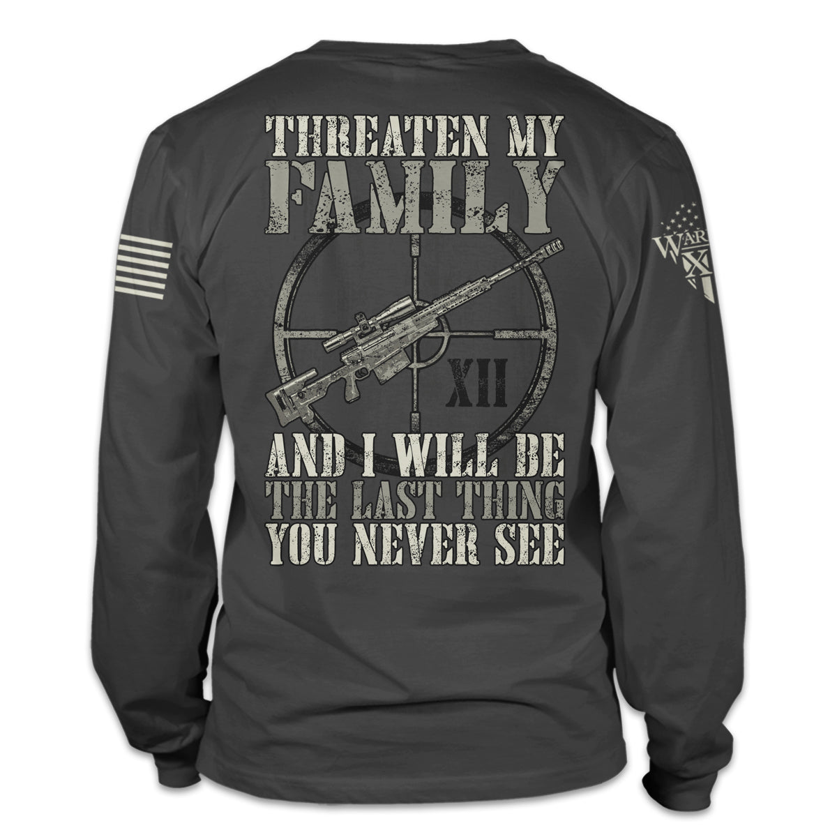 A grey long sleeve shirt with the words "Threaten My Family and I'll Be The Last Thing You Never See" and a gun printed on the back of the shirt.