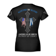 A black women's relaxed fit shirt with the words "Scottish by blood, American by birth, patriot by choice" with a cross holding the American and Scottish flag printed on the back of the shirt.