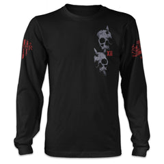 A black long sleeve shirt with two skulls with arrows through them printed on the front of the shirt.