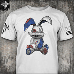 "Stitched Bunny" is printed on a white t-shirt with the main design printed on the front and the back of this t-shirt has no printing. This shirt features our brand logo on the right sleeve and the American Flag on the left sleeve.