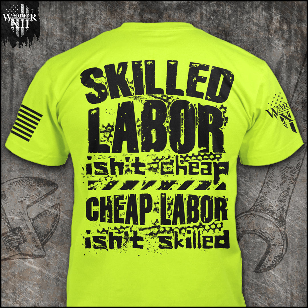 "Skilled Labor" is printed on a Hi vis t-shirt with the main design printed on the back and a small print on the front left chest.  This shirt features our brand logo on the right sleeve and the American Flag on the left sleeve.