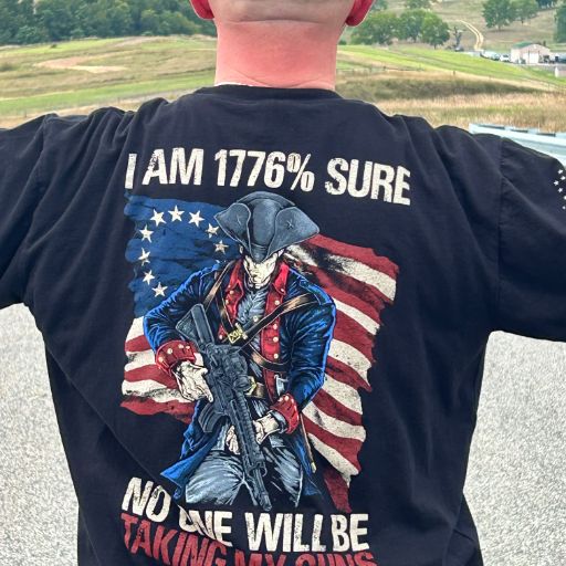 Happy customer showing off his 1776% Sure t-shirt.