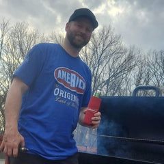One of our customers enjoying a cold one while sporting our America-The Original t-shirt.