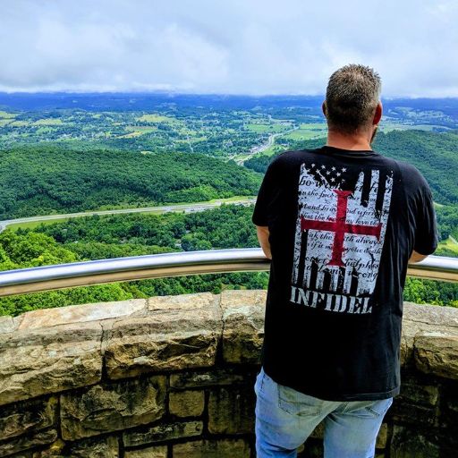 Verified customer taking in the beauty of America while wearing our American Infidel t-shirt.