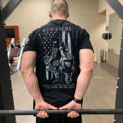 Customer working out, sporting his American Spartan TBL t-shirt. 