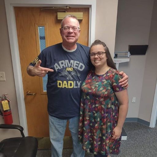 Lovely photo of Father and Daughter. Dad is definitely enjoying his Armed and Dadly shirt in this photo!