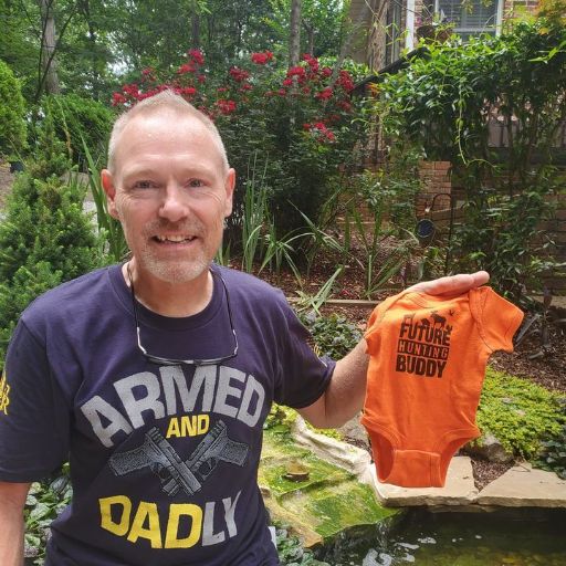One of our awesome customers and expecting Dad to be enjoying his Armed and Dadly t-shirt.