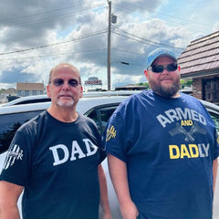 Two of our wonderful customers enjoying Father's Day in their Armed and Dadly and Dad Defined t-shirts. 