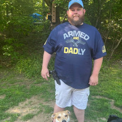 One of our awesome customers enjoying his Armed and Dadly t-shirt. 