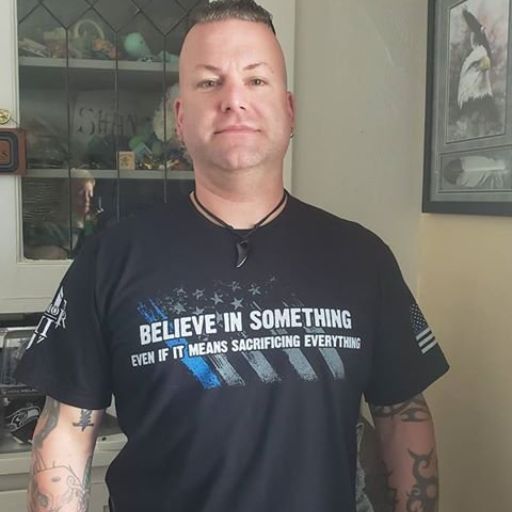 One of our customers proudly wearing his Believe in Something t-shirt. 