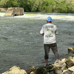 One of our customers enjoying a day at the river while wearing his Big Girls t-shirt. 