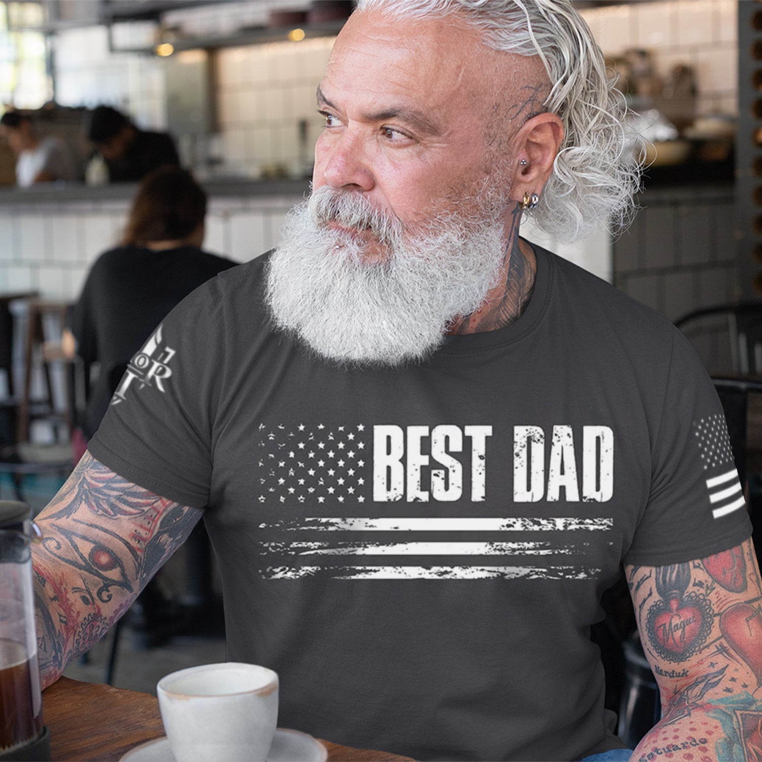 A proud father sporting our new best dad T-Shirt.