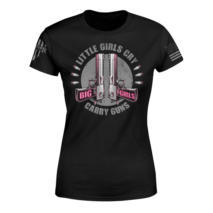 "Big Girls Carry - Women's Relaxed Fit" is printed on a Black t-shirt with the main design printed on the the front and the back of this t-shirt has no printing. This shirt features our brand logo on the right sleeve and the American Flag on the left sleeve.