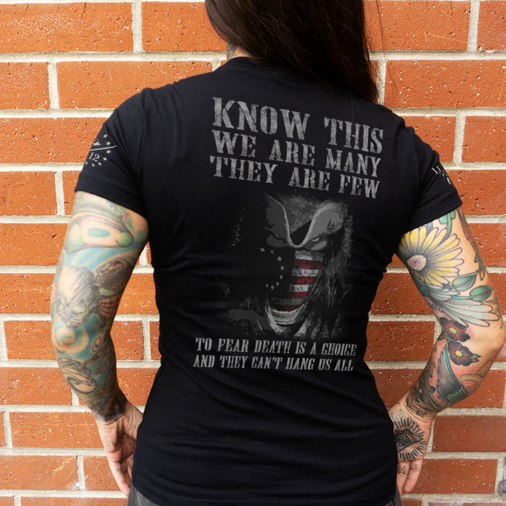 Front & back women's black t-shirt with the words, "Know This, We Are Many They Are Few. To Fear Death Is A Choice, And They Can't Hang Us All" on the back and the words "Join Or Die" on the front.