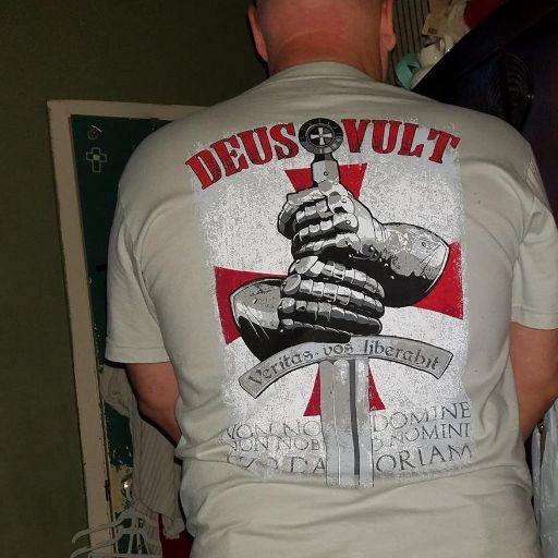 A happy customer wearing his new Deus VultT-shirt.