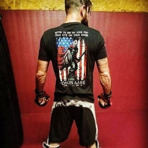 Fightin like a true warrior while wearing our new Die On Your Feet T-shirt.