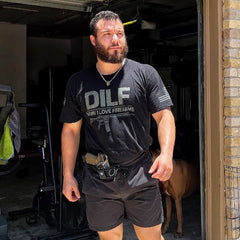 Customer being prepared while wearing our DILF T-shirt. 
