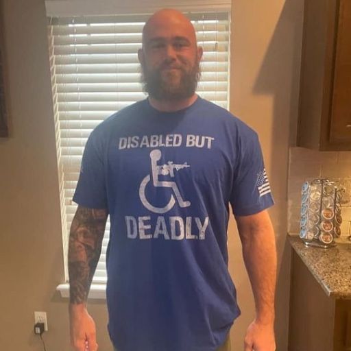 A true warrior wearing our Disabled But Deadly T-Shirt.
