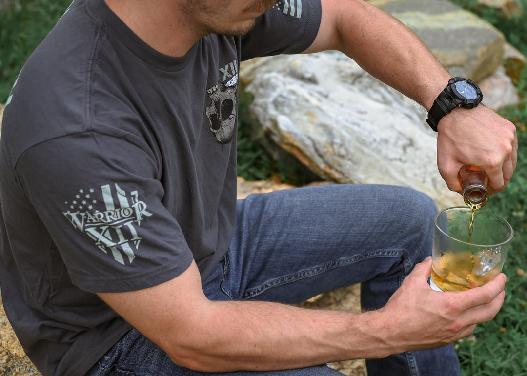 Happy customer showing off his Drink With Your Enemies t-shirt.