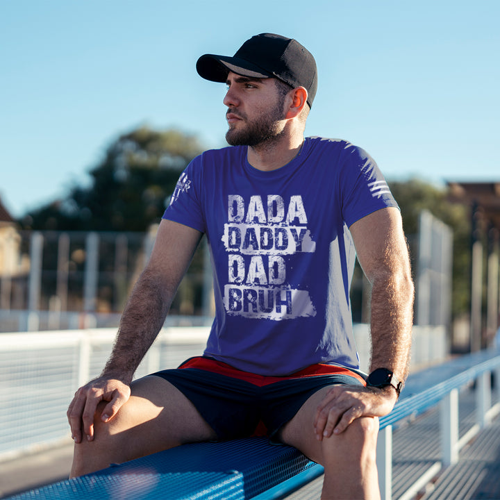 A proud dad sporting our Dada, Daddy, Dad, Bruh T-shirt.