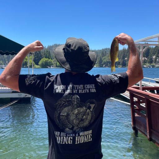Fishing like a true warrior  while wearing his new Die Like A Warrior T-shirt.