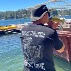 Fishing like a true warrior while wearing his new Die Like A Warrior T-shirt.