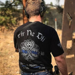 At the range like a warrior sporting our Fir Na Dli T-shirt.