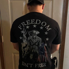 A happy warrior sporting their new Freedom Isn't Free T-shirt.