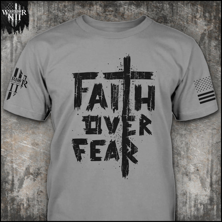 "Faith Over Fear 2.0" is printed on a gray t-shirt with the main design printed on the the front and the back of this t-shirt has no printing. This shirt features our brand logo on the right sleeve and the American Flag on the left sleeve.