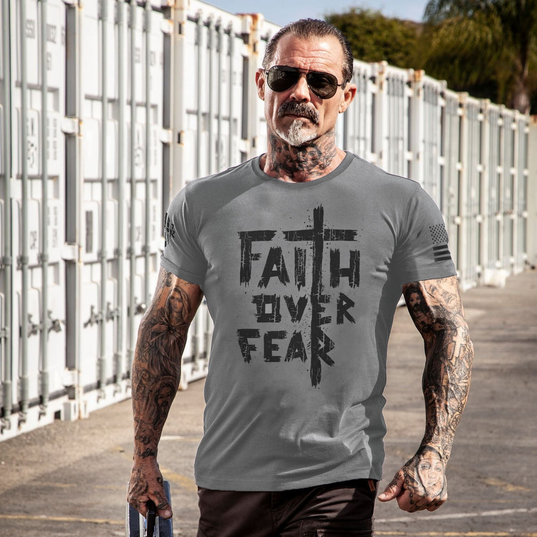 Happy customer showing off his Faith Over Fear t-shirt.