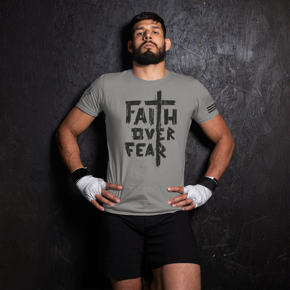 Happy customer showing off his Faith Over Fear t-shirt.