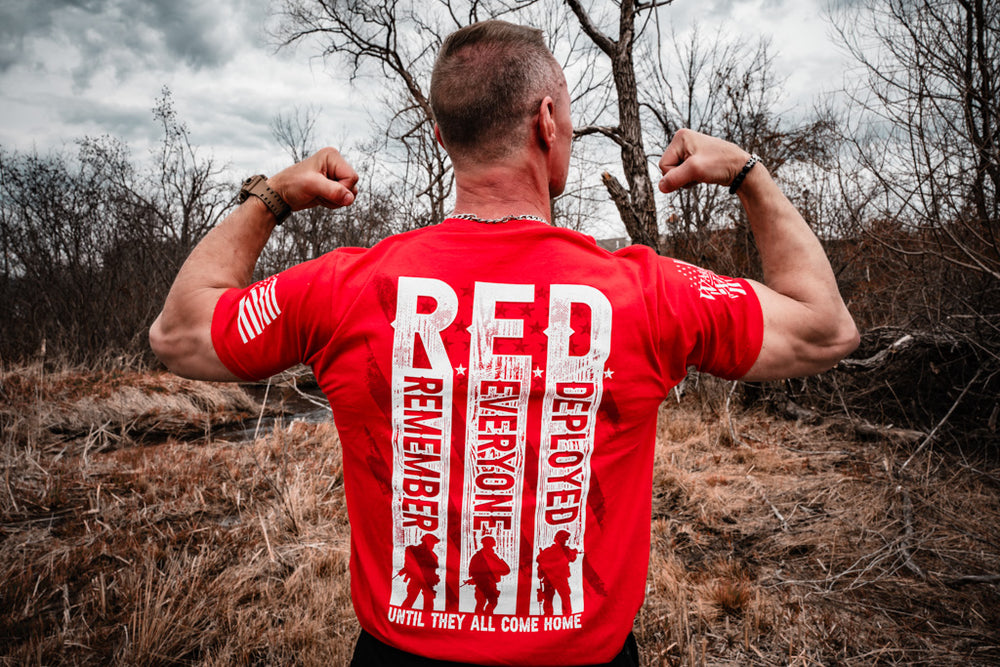 Happy customer showing off his Remember Everyone Deployed t-shirt.