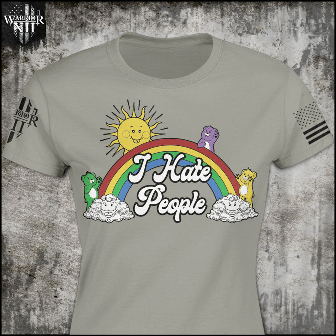 A grey women's relaxed fit'shirt with the words "I Hate People" with bears, rainbow and clouds printed on the front of the shirt.