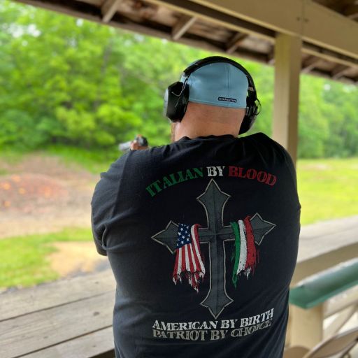 At the range while wearing our Italian By Blood T-Shirt.